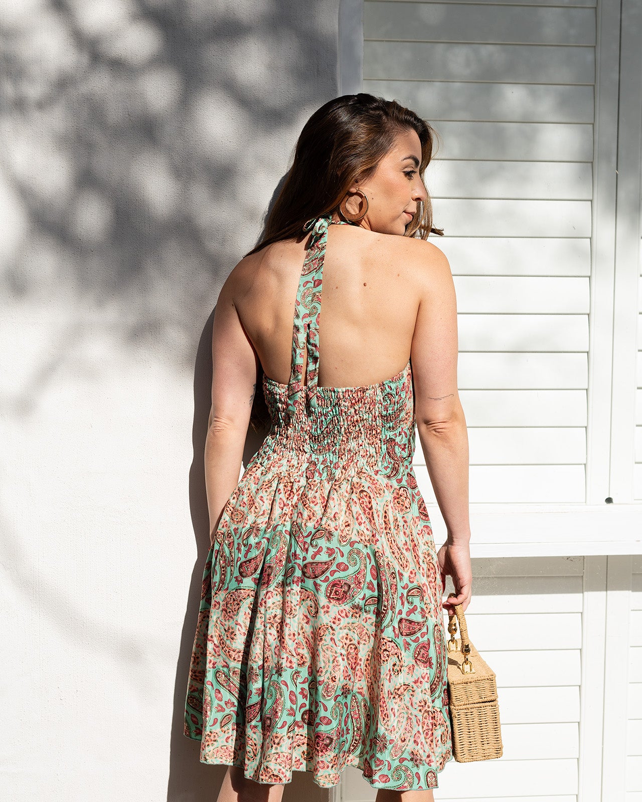 Cabarita Green Mini Dress featuring a beautiful paisley print in soft greens and blush pinks