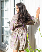 Kirra Purple Mini Dress featuring a paisley print in soft purples, creams, and gold accents