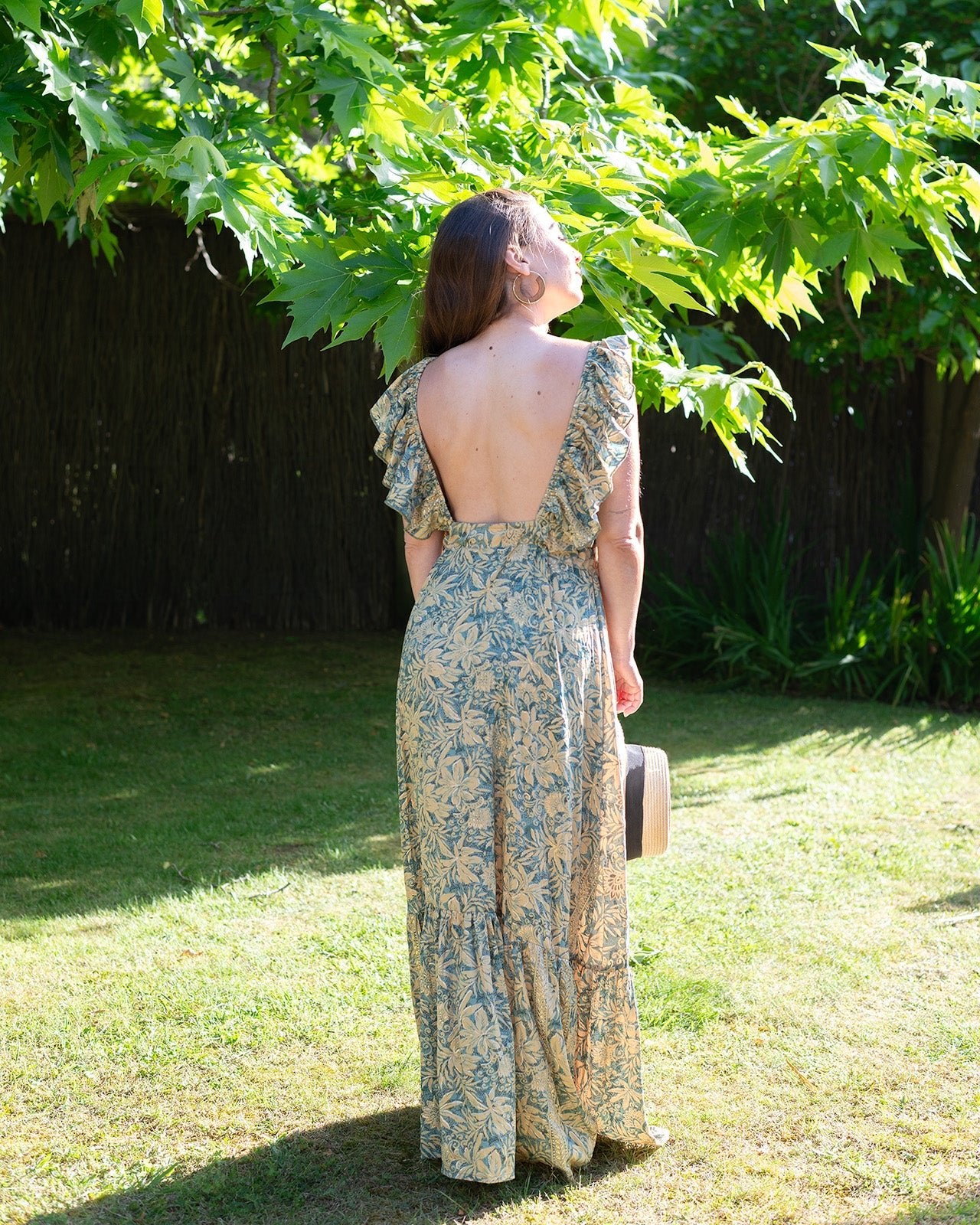 Kooringal Maxi Dress featuring a floral print in soft gold and muted green with V-neckline