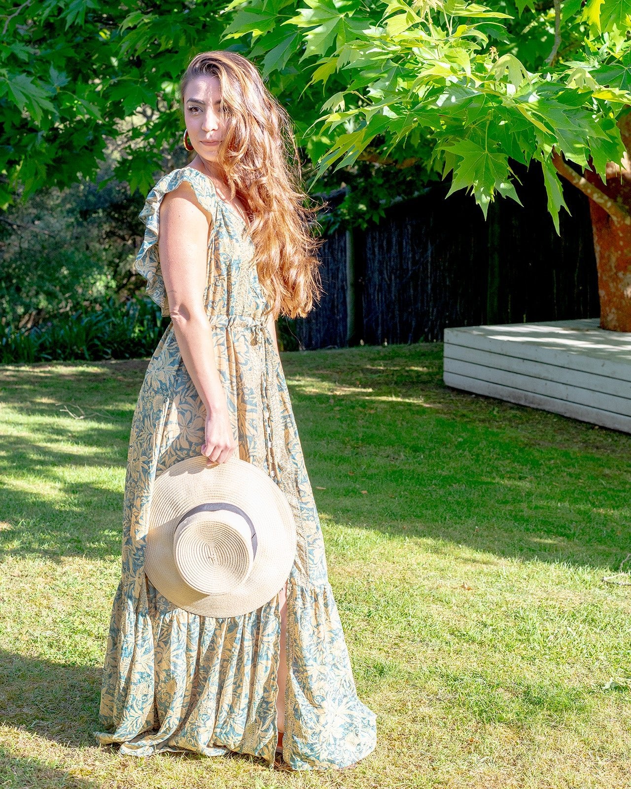 Kooringal Maxi Dress featuring a floral print in soft gold and muted green with V-neckline